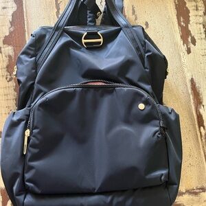 Pacsafe Black Backpack with Gold Accents